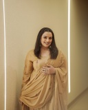 swetha-menon-in-coffee-brown-churidar-dress-photos-006