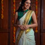 actress priya varrier onam saree photos 2021