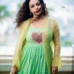 nithya menon new photos in green salwar suit 002