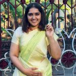 sanusha santhosh new photos in green saree 004