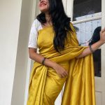 anikha surendran new photos in golden yellow saree 002