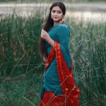 anu sithara in red and blue saree latest images