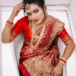 mareena michael kurisingal in red saree