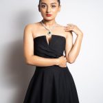 esther anil in black off shoulder gown