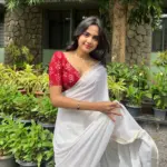 devika sanjay in white saree with red blouse combination photos. 449043804 1921881121616765 8102759229676678765 n