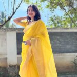 esther anil in yellow saree photos 002