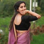 niranjana anoop in violet saree with black blouse photos