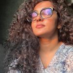 parvathy thiruvothu curly hair photos 004