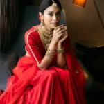 shriya saran in red lehenga look photos