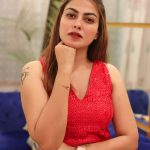 anusree in red sleeveless dress photos