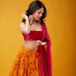 nandana varma in sleeveless blouse yellow lehenga 002