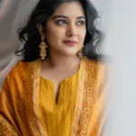 nivetha thomas beautiful mango yellow salwar suit images 006