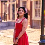 rima kallingal in summer wear fit and flare red dress photos 004