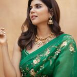 celebrity kalyani priyadarshan in dark green saree with green blouse 006