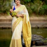 anumol in kerala saree with blue blouse combination images