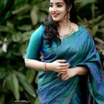 malavika menon in peacock color saree photos 006