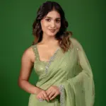 saniya iyappan in green chiffon saree with sleeveless blouse design photos 005