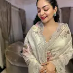 ahaana krishna in off white floral printed saree with makeup look photos 001