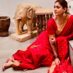 nayanthara in red pattu saree with heavy ornaments and makeup look photos