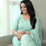 kavya madhavan in green shades colour saree photos