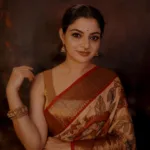 nikhila vimal in kanchivaram pattu sarees with designer blouse photos