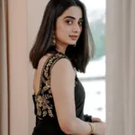 namitha pramod in black saree with sleeveless heavy work blouse photos