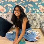 nimisha sajayan in funky jeans with black sleevless crop top photos 002