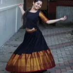 niranjana anoop in heavy border black pattupavada and blouse photos