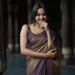 devika sanjay in violet tissue saree photos 006