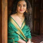 mareena michael kurisingal in green pattu saree photos 001