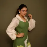 nikhila vimal in flower printed olive green and white dress photos 003