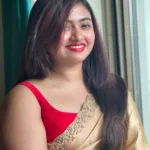 shaalin zoya in golden saree with red sleeveless wide neck photos 006