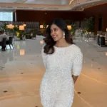 anju kurian in bodycon white dress photos 005